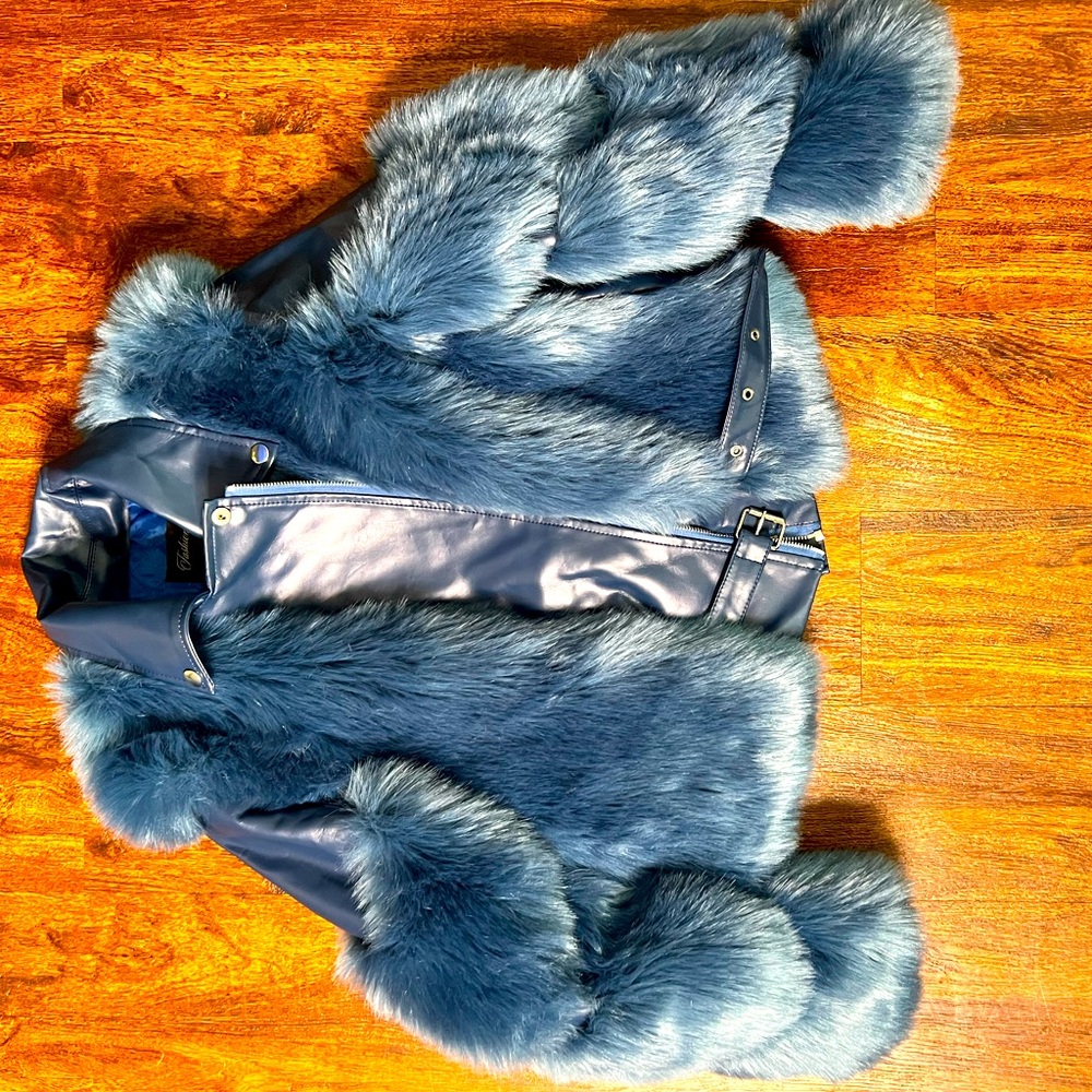 Blue faux fur, vegan leather jacket. Very warm. Excellent condition.